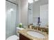 Simple bathroom with shower/tub combo and granite vanity at 1928 9Th St, Sarasota, FL 34236