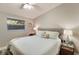 Spacious bedroom with large window and ceiling fan at 1928 9Th St, Sarasota, FL 34236