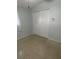 Bright bedroom with double doors and speckled flooring at 1928 9Th St, Sarasota, FL 34236