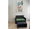 Relaxing patio area with wicker furniture and a glass-top coffee table at 1928 9Th St, Sarasota, FL 34236