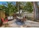 Spacious backyard with patio furniture and a built-in grill at 1928 9Th St, Sarasota, FL 34236