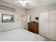 Bright bedroom with double bed, dresser, and ample closet space at 1928 9Th St, Sarasota, FL 34236
