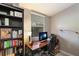 Home office with built-in shelving and desk at 1928 9Th St, Sarasota, FL 34236