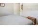 Simple bedroom with a full-size bed and side table at 1928 9Th St, Sarasota, FL 34236