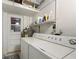 Functional laundry room with washer and dryer at 1928 9Th St, Sarasota, FL 34236