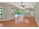 Gathering room with hardwood floors, pool view, and sliding doors at 259 Dahlia Ct, Bradenton, FL 34212