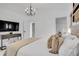 Bright bedroom with king-size bed and stylish decor at 158 Allworthy St, Port Charlotte, FL 33954