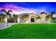 Single-story home with a landscaped yard at sunset at 158 Allworthy St, Port Charlotte, FL 33954