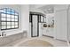Bathroom with soaking tub, walk-in shower, and updated vanity at 158 Allworthy St, Port Charlotte, FL 33954