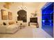 L-shaped sectional sofa and a large TV in a living room at 158 Allworthy St, Port Charlotte, FL 33954