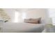 Main bedroom with a plush bed and calming decor, creating a relaxing atmosphere at 18770 Mcgrath Cir, Port Charlotte, FL 33948