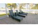 Relaxing screened-in patio with lounge chairs, perfect for enjoying Florida sunshine at 18770 Mcgrath Cir, Port Charlotte, FL 33948