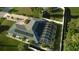 Property features solar panels and a large, screened pool area at 18770 Mcgrath Cir, Port Charlotte, FL 33948