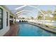 Relaxing screened-in pool area, perfect for outdoor enjoyment at 18770 Mcgrath Cir, Port Charlotte, FL 33948