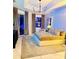 Elegant main bedroom with a large bed and floor-to-ceiling windows at 11061 Sandrift Ave, Englewood, FL 34224