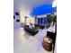 Spacious living room with marble floors and stylish furniture at 11061 Sandrift Ave, Englewood, FL 34224