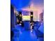 Modern living room with electric fireplace and stylish seating at 11061 Sandrift Ave, Englewood, FL 34224