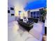 Elegant living room featuring marble floors and comfortable seating at 11061 Sandrift Ave, Englewood, FL 34224