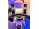 Modern living room with electric fireplace and stylish seating at 11061 Sandrift Ave, Englewood, FL 34224