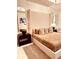 Spacious main bedroom with a king-size bed and high ceilings at 11061 Sandrift Ave, Englewood, FL 34224