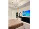 Spacious main bedroom with a king-size bed and modern decor at 11061 Sandrift Ave, Englewood, FL 34224