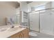 Clean and bright bathroom with tile flooring, shower/tub combo, and vanity at 1206 86Th Nw Ct, Bradenton, FL 34209