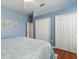 Bright bedroom with plush carpeting, large closets, and ample space for a king-size bed at 1206 86Th Nw Ct, Bradenton, FL 34209