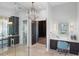Spa-like bathroom with walk-in shower, vanity, and walk-in closet at 3482 Flamingo Ave, Sarasota, FL 34242