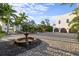 Elegant motor court with a central fountain at 3482 Flamingo Ave, Sarasota, FL 34242