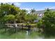 Private dock with boat lift, offering water access at 3482 Flamingo Ave, Sarasota, FL 34242