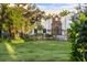 Stunning white exterior with arched entryway at 3482 Flamingo Ave, Sarasota, FL 34242