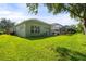 House exterior showcasing landscaping and pool area at 1206 86Th Nw Ct, Bradenton, FL 34209