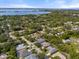 Aerial view of waterfront community, showcasing homes and lush landscape at 1206 86Th Nw Ct, Bradenton, FL 34209