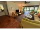 Living room with sliding doors leading to a patio at 3500 El Conquistador Pkwy # 307, Bradenton, FL 34210