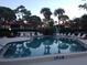 Inviting community pool with ample lounge chairs at 3500 El Conquistador Pkwy # 307, Bradenton, FL 34210