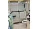 Bathroom with walk-in shower, toilet, and granite vanity at 3500 El Conquistador Pkwy # 307, Bradenton, FL 34210