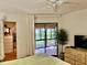 Bedroom with sliding doors to a private patio at 3500 El Conquistador Pkwy # 307, Bradenton, FL 34210