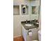 Bathroom featuring a granite vanity, toilet and walk in shower at 3500 El Conquistador Pkwy # 307, Bradenton, FL 34210