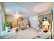 Relaxing sunroom with wicker chairs and beach decor at 6428 Fleetwood Ct, North Port, FL 34287