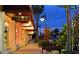 Evening view of various shops and stores on a street at 549 Sloop Ln, Longboat Key, FL 34228