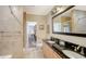 Bathroom with double sinks, a shower, and a toilet at 549 Sloop Ln, Longboat Key, FL 34228