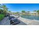 Stunning waterfront view with outdoor seating and a pergola at 549 Sloop Ln, Longboat Key, FL 34228