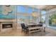 Kitchen dining area with large windows, and a view of the pool at 549 Sloop Ln, Longboat Key, FL 34228