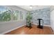 Home gym with exercise equipment and wood flooring at 549 Sloop Ln, Longboat Key, FL 34228