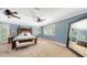 Spacious Primary bedroom with large mirror and private access to balcony at 549 Sloop Ln, Longboat Key, FL 34228