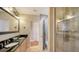 Bathroom with double sinks, a shower, and a bathtub at 549 Sloop Ln, Longboat Key, FL 34228