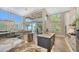 Bright kitchen features granite island, stainless steel appliances, and water views at 549 Sloop Ln, Longboat Key, FL 34228
