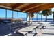 Relaxing waterfront picnic pavilion with multiple tables and benches at 549 Sloop Ln, Longboat Key, FL 34228