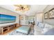 Bright Gathering room with vaulted ceilings, comfortable seating and large TV at 549 Sloop Ln, Longboat Key, FL 34228