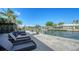 Relaxing waterfront view with outdoor seating and a pergola at 549 Sloop Ln, Longboat Key, FL 34228